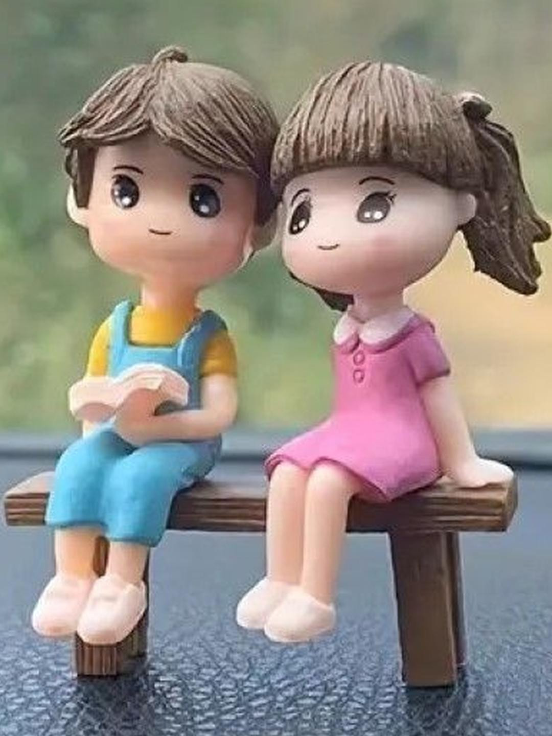 ANTIQ CREATION Book Reading Couple Sitting on Bench Yellow Polyresin Matte Living Room Small Showpiece - 2.4 Inches