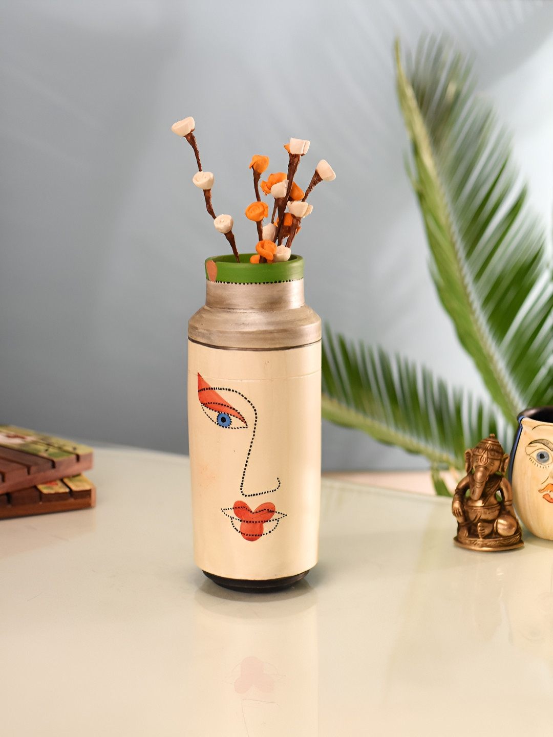 AAKRITI ART CREATIONS Beige & Red Contemporary Face Printed Terracotta Vase