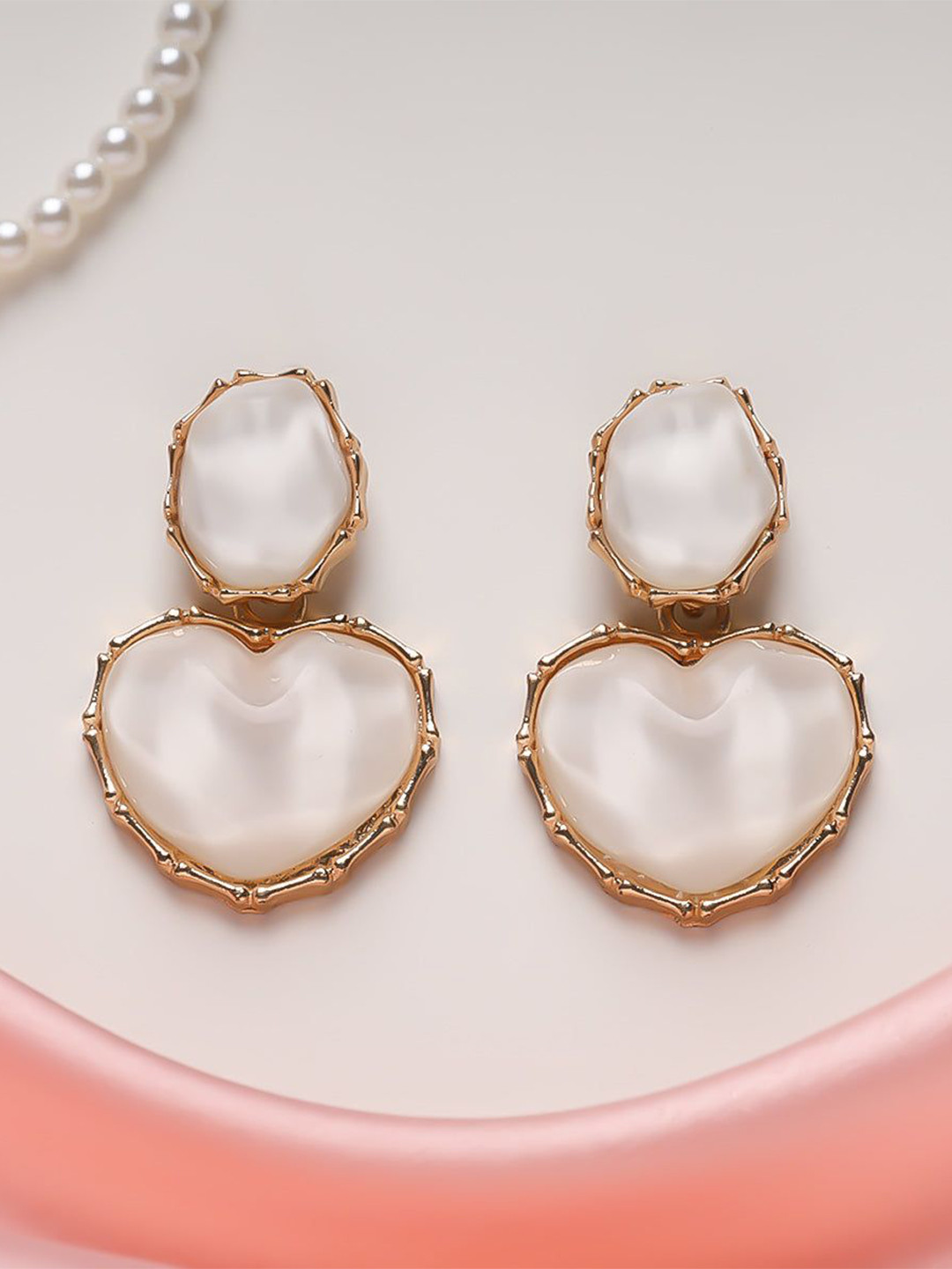 Estailo fashion Ivory Glow Artificial Stone Studded Heart Shaped Drop Earrings