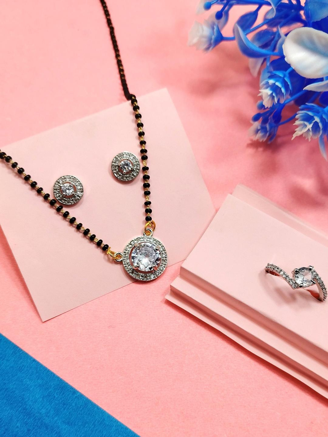 DIVYANSHI COLLECTION Brass American Diamond Silver-Plated Jewellery Set