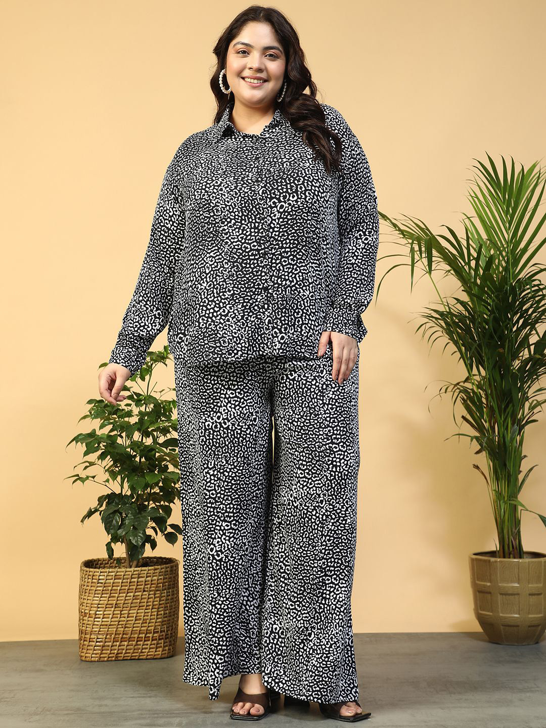 Women Plus Size Black Animal Print Collared Shirt with Flared Pants Co-ord Set