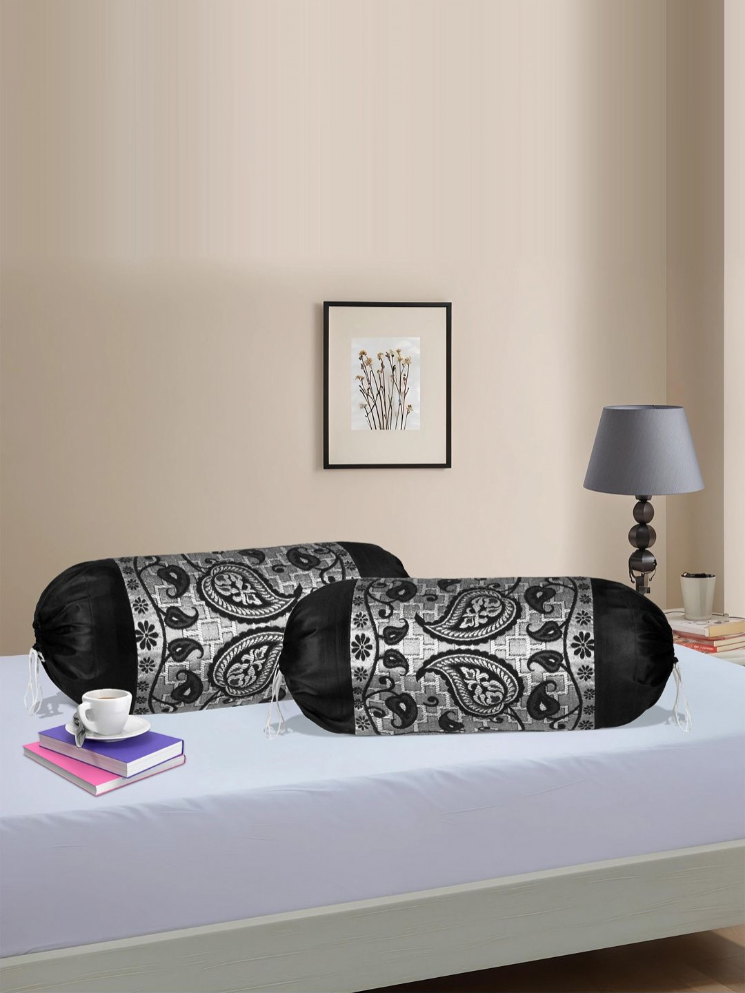 Myntra Elegant Homes 2-Pcs Black Printed Bolster Pillow Cover With Dori