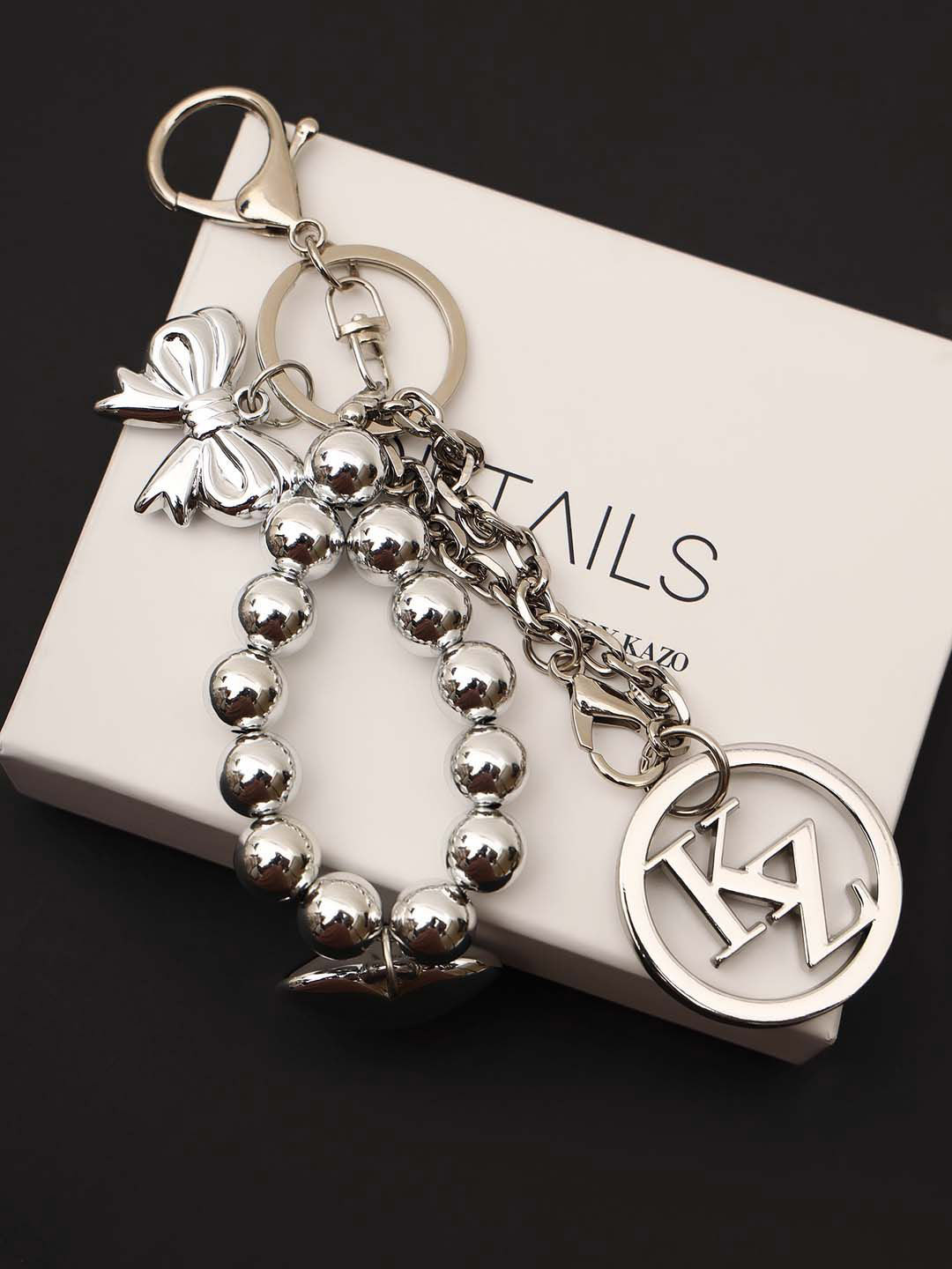 Kazo Whispers Of Silver Bag Charm