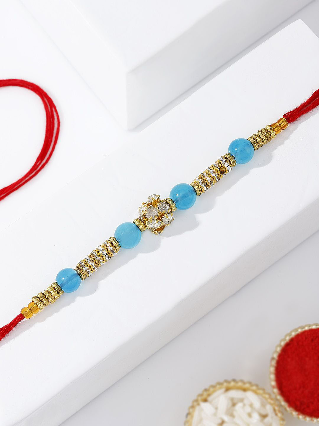 IGP Stone Studded & Pearls Beaded Thread Rakhi With Roli Chawal