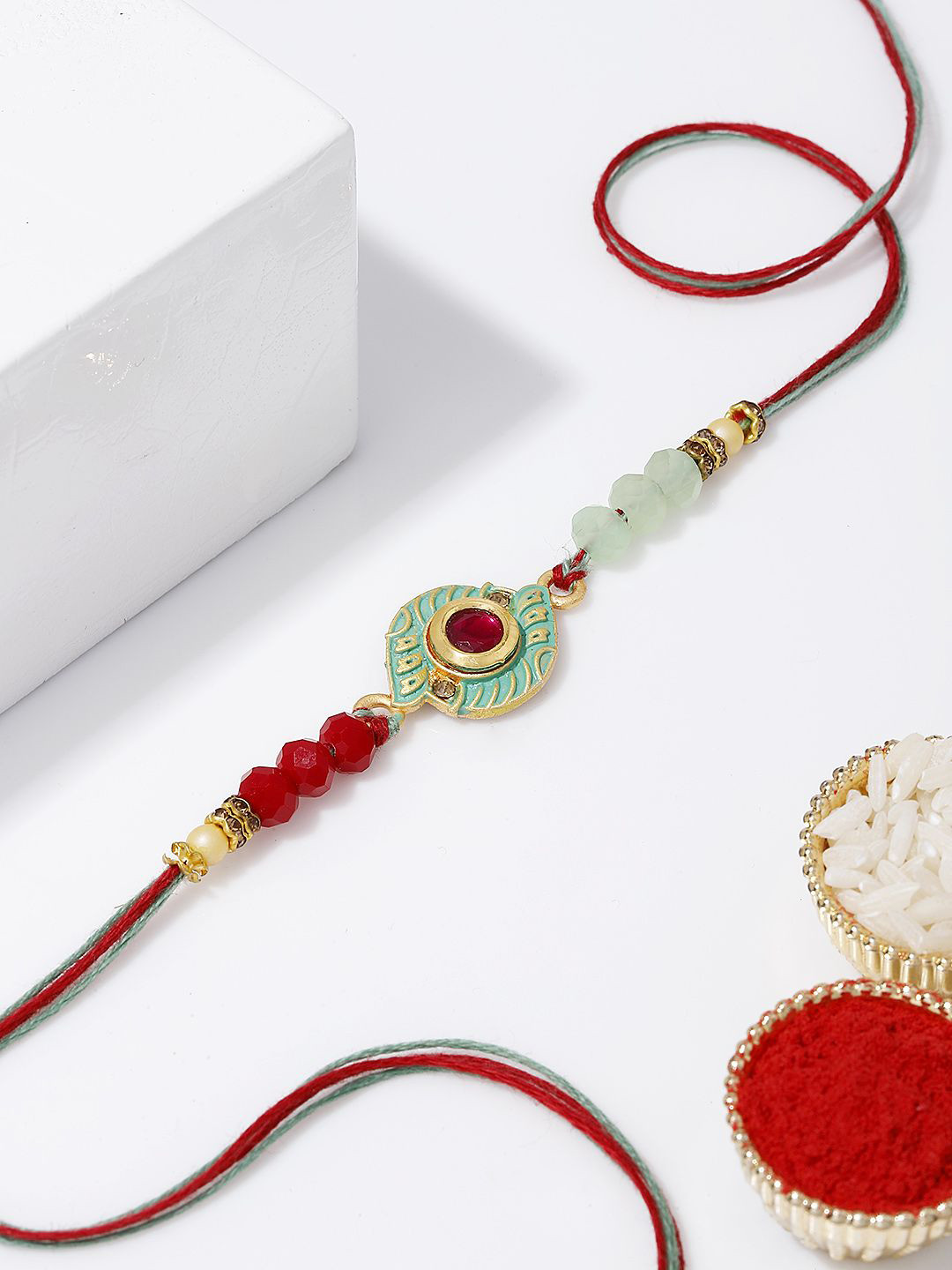 IGP Unisex Thread Beautiful Ruby Bead Rakhi with Tie-Ups Closure