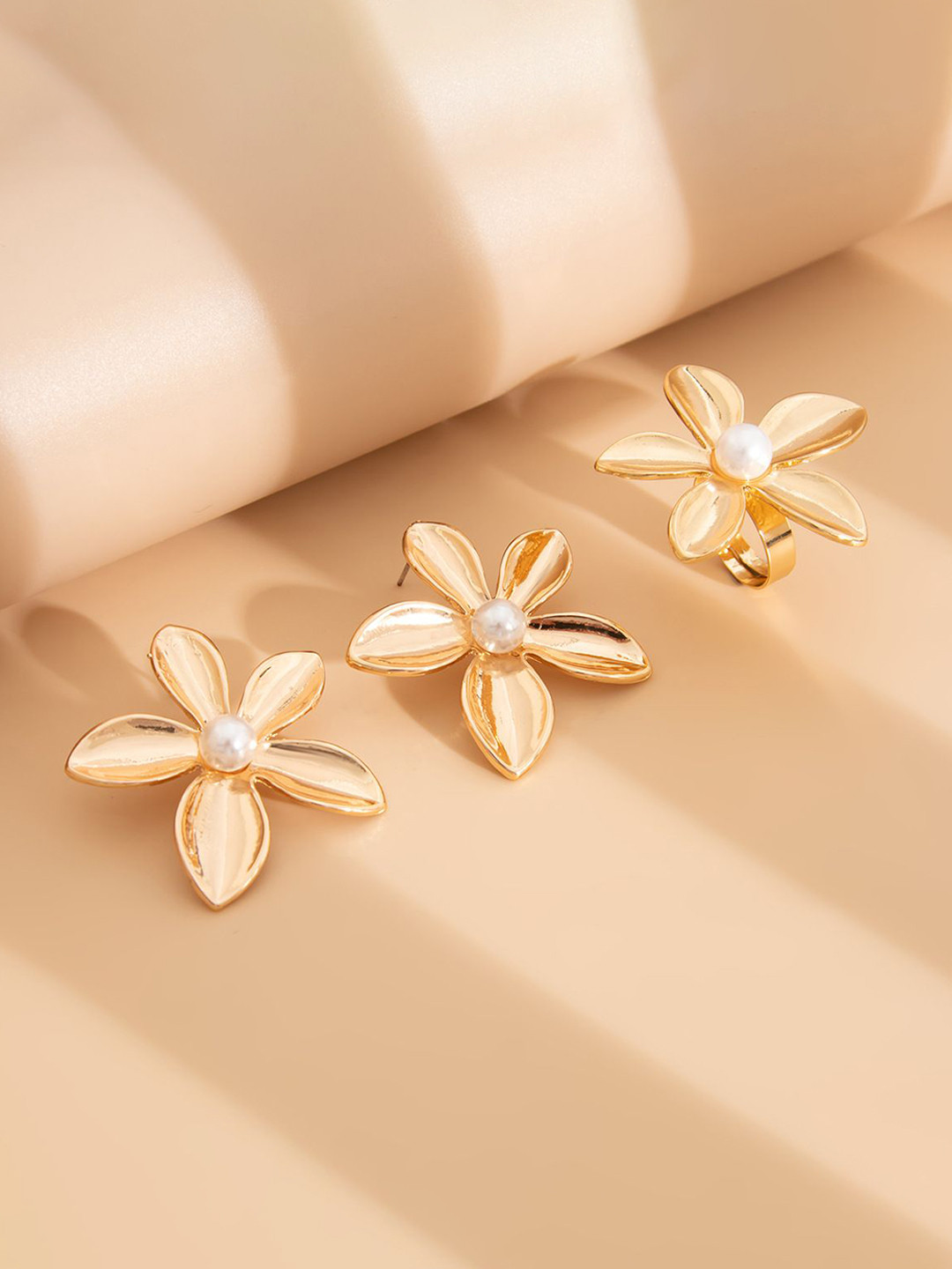 StyleCast x Revolte Gold Plated Pearls beaded Floral Shaped Studs with Finger Ring