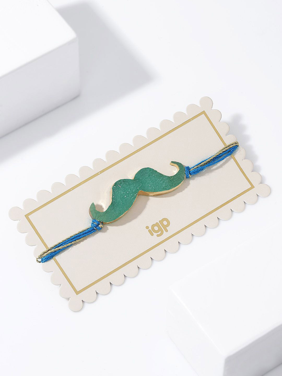 IGP Moustache Shaped Thread Rakhi With Roli Chawal