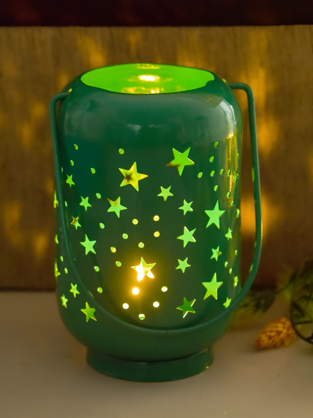 Myntra Elegant Homes Green Round Star Lantern Candle Holder