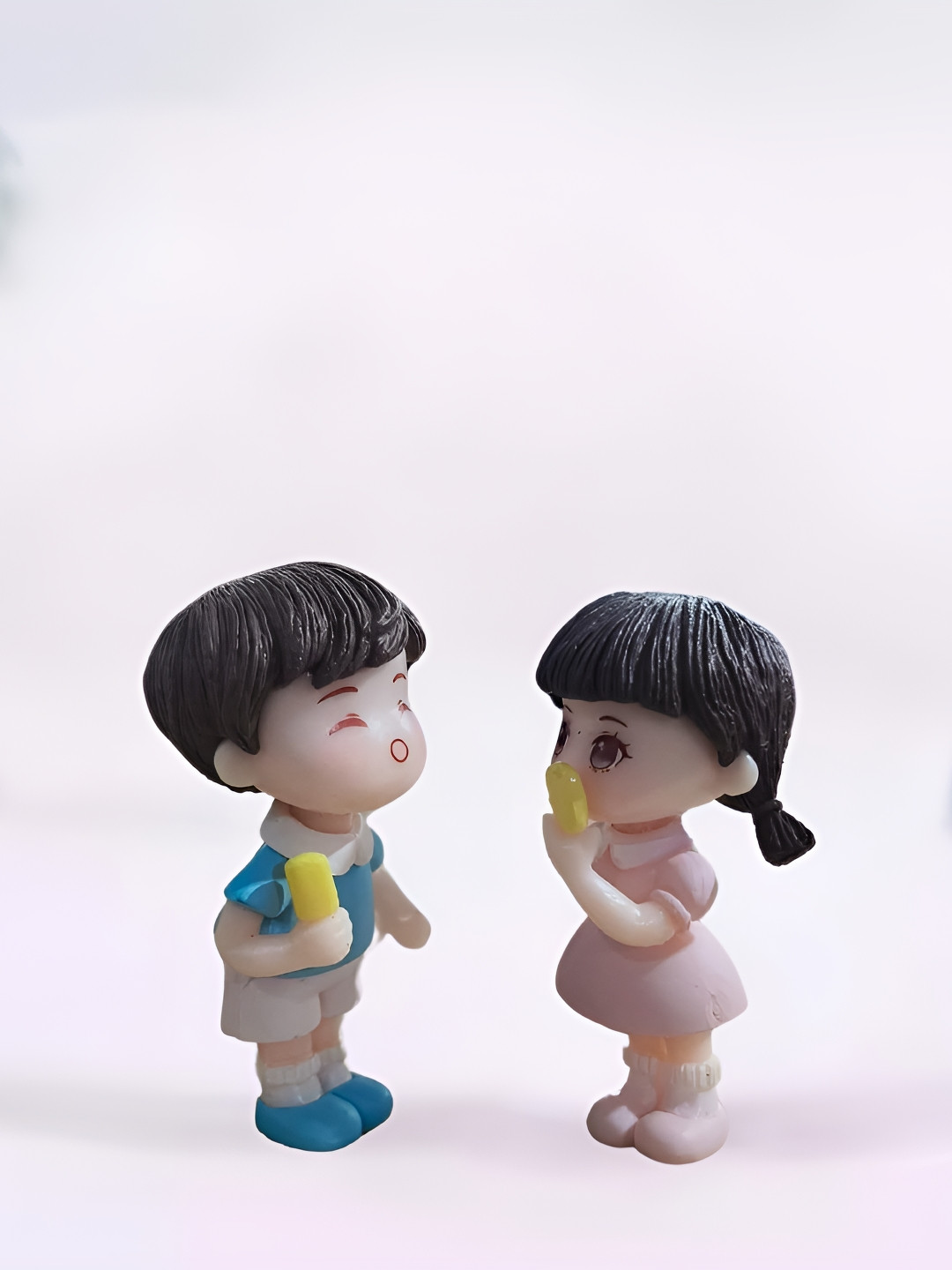 Go Hooked Couple Model Multicoloured Polyresin Glossy Living Room Set of 2 Tiny Showpieces - 2 Inches