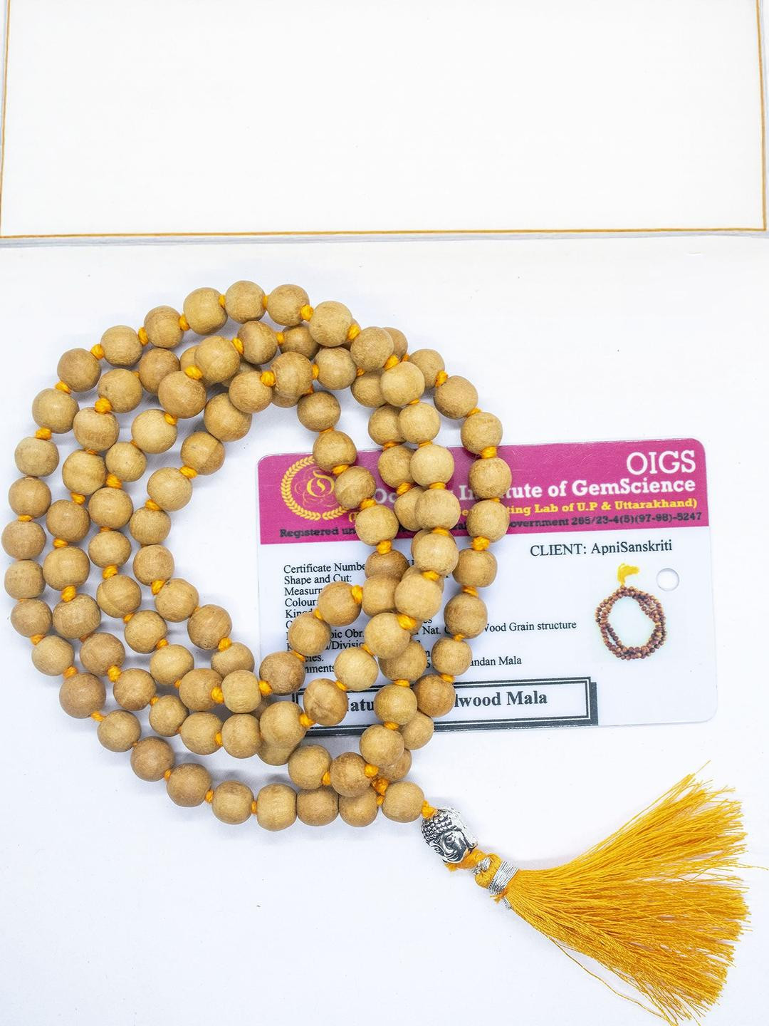 Apnisanskriti Unisex Chandan Sandalwood Buddha Face 108+1 7mm Mala