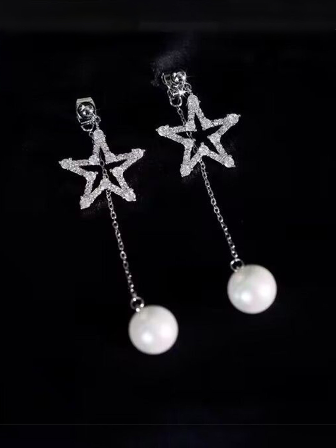 DIVASTRI Silver Plated American Diamond Studded Star Shaped Korean Drop Earrings