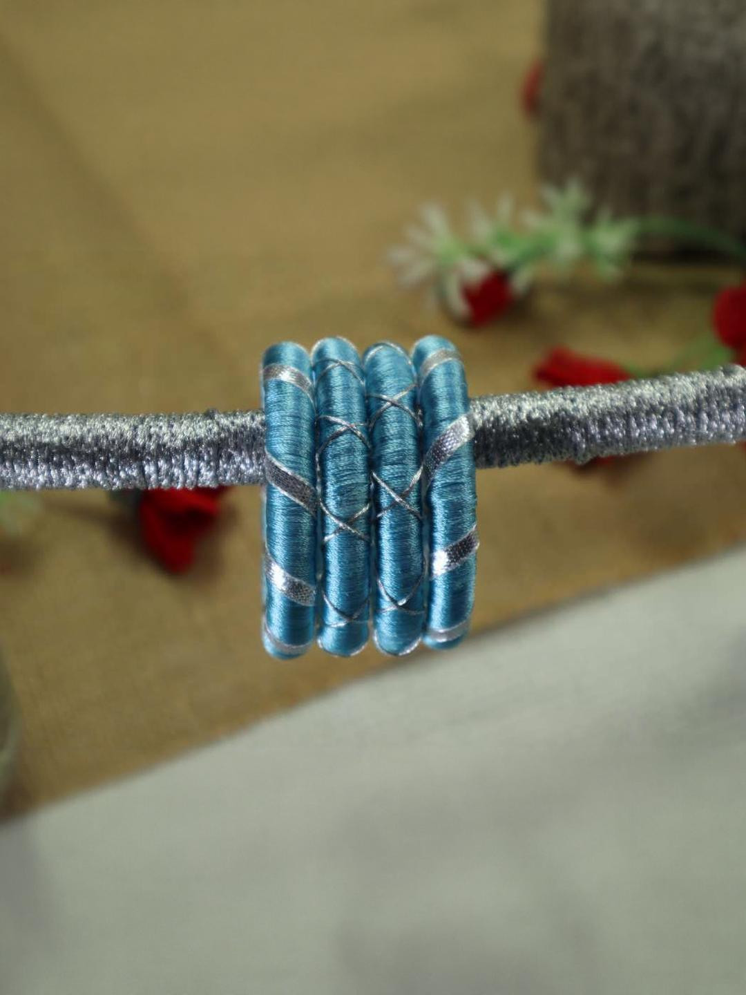 Kamule Turquoise Blue Plastic Bangle