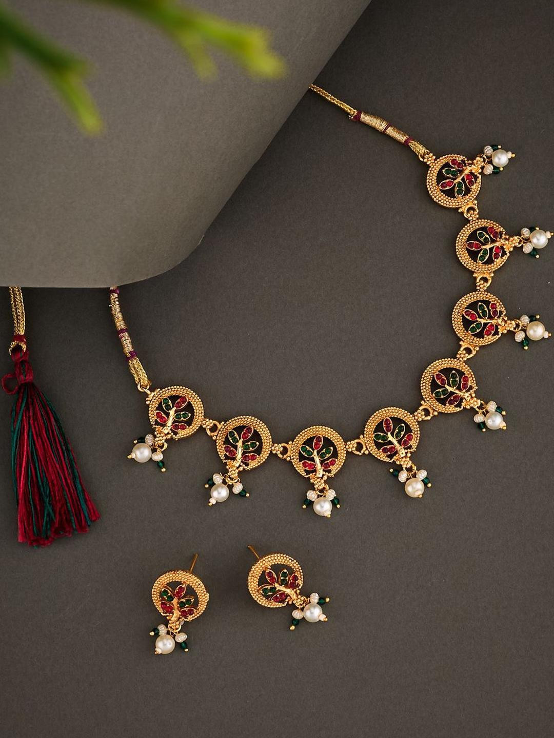 Anouk Gold plated & Leaf-Round Shaped multicoloured stone studded-beaded jewellery set