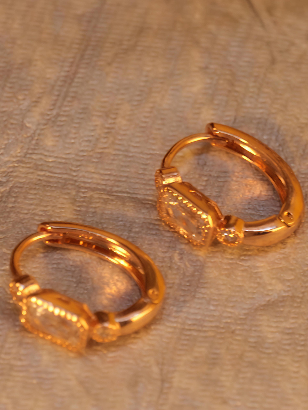 JIYANSHI FASHION  Rose Gold-Plated Stones Studded Hoop Shaped Antique Finish Bali Earrings