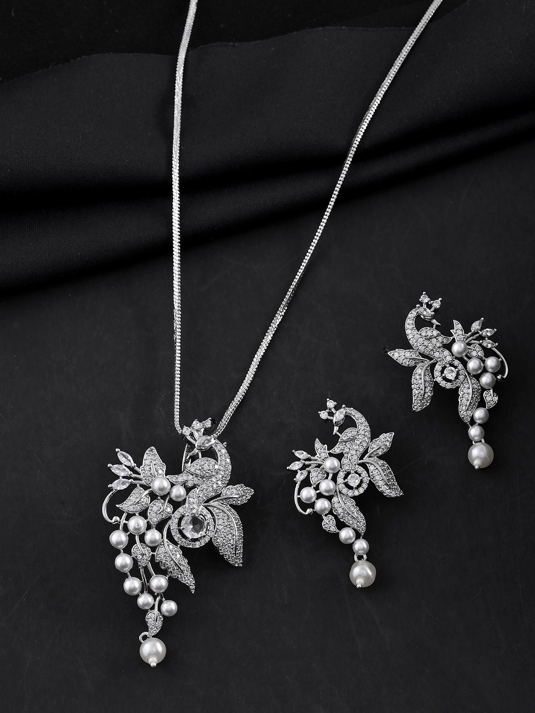 VOJ Silver Plated American Diamond Studded & Beaded Peacock Shaped Pendant Set