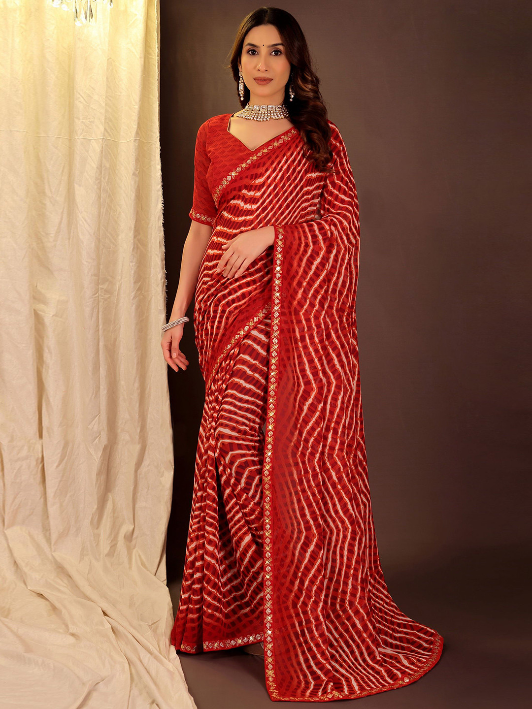 Moda Rapido Leheriya Sequinned Pure Georgette Leheriya Saree