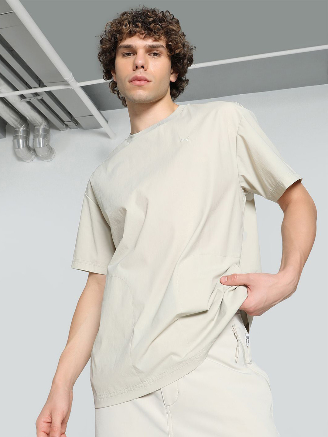 Puma MMQ SPORT Woven Relaxed Fit Tee