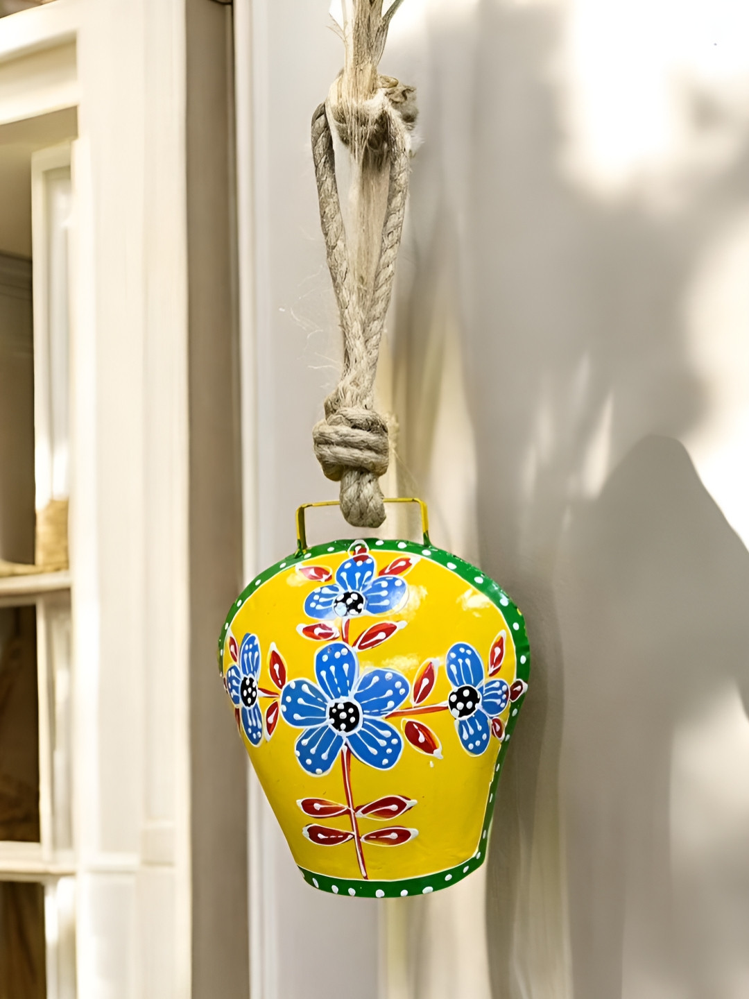 DULI Yellow & Green Printed Cowbell Wall Hanging