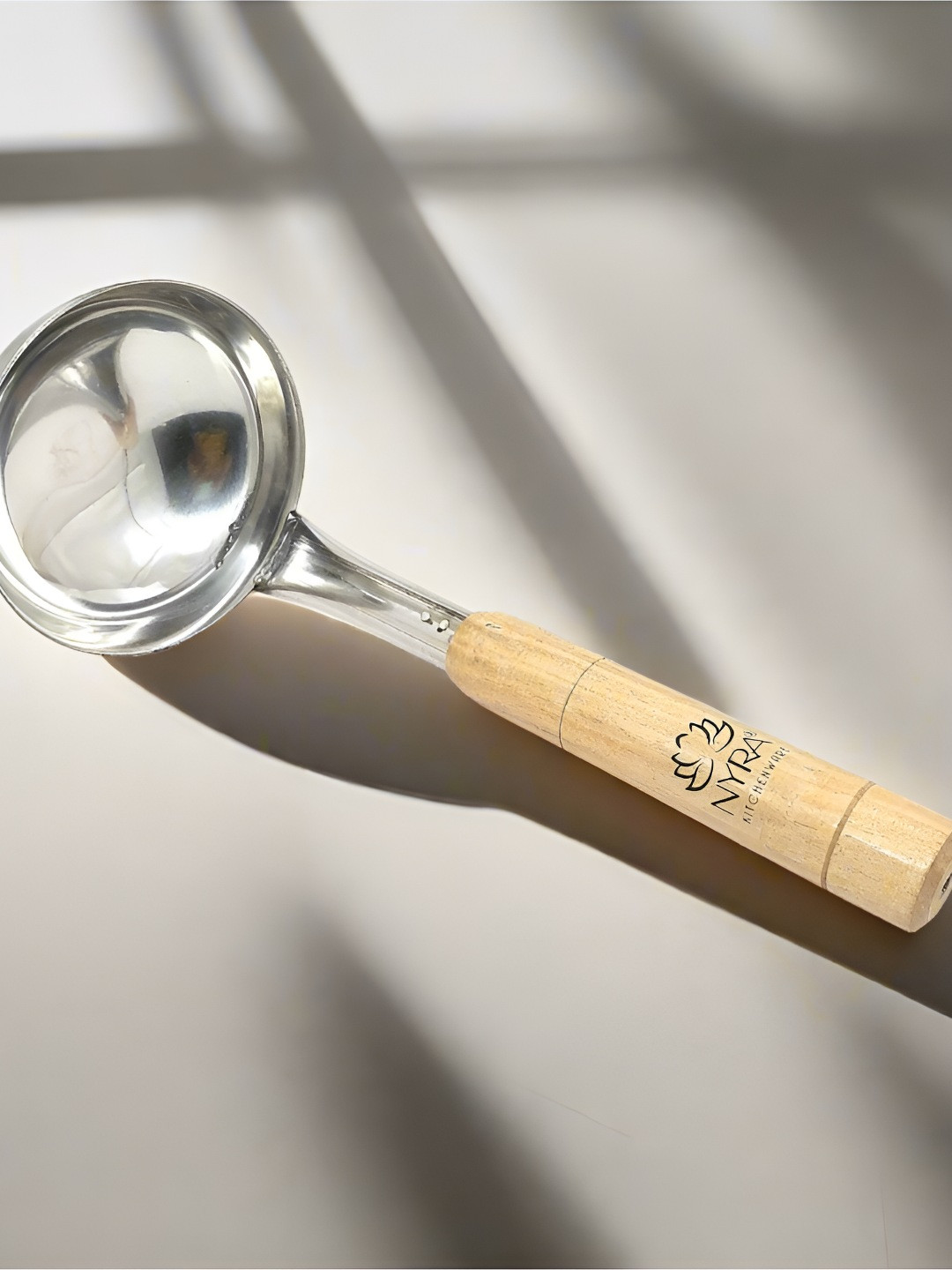 Nyra Kitchenware Silver-Toned & Beige Stainless Steel Ladle With Wooden Handle-1 L