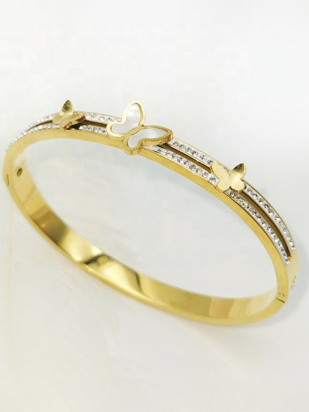 SZN Gold-Plated Crystals Stone Studded Butterfly Design Bangle-Style Bracelet