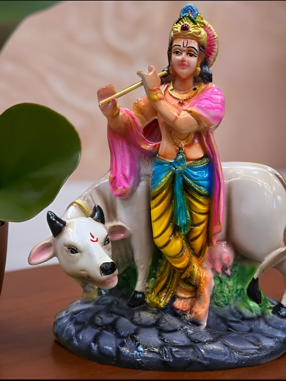 SANKALAN CREATIONS Krishna Ji with Cow Orange Polyresin Natural Prayer Room Medium Showpiece - 8.7 Inches