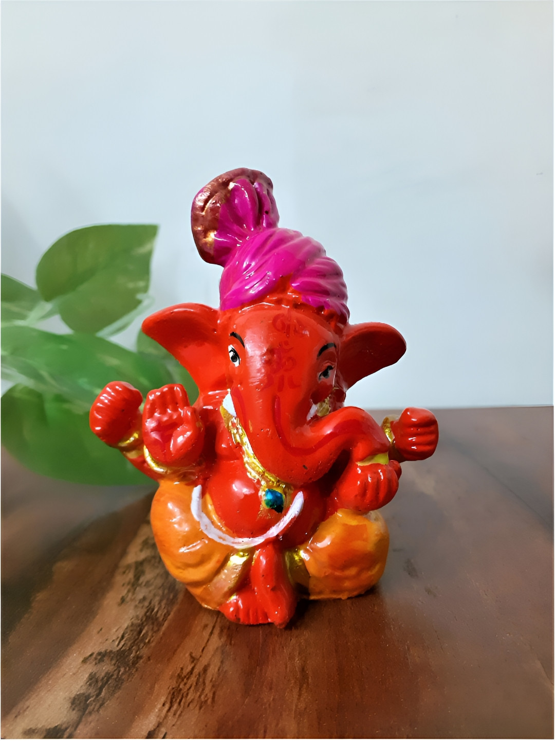 Afterstitch Lord Ganesha Orange Polyresin Glossy Prayer Room Small Showpiece - 2.8 Inches
