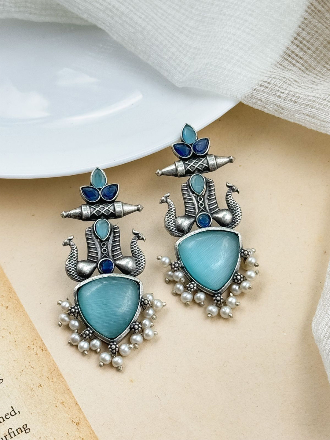 NAMAN ARTS Silver-Plated Stones Studded & Beaded Peacock Shaped Monalisa Drop Earrings