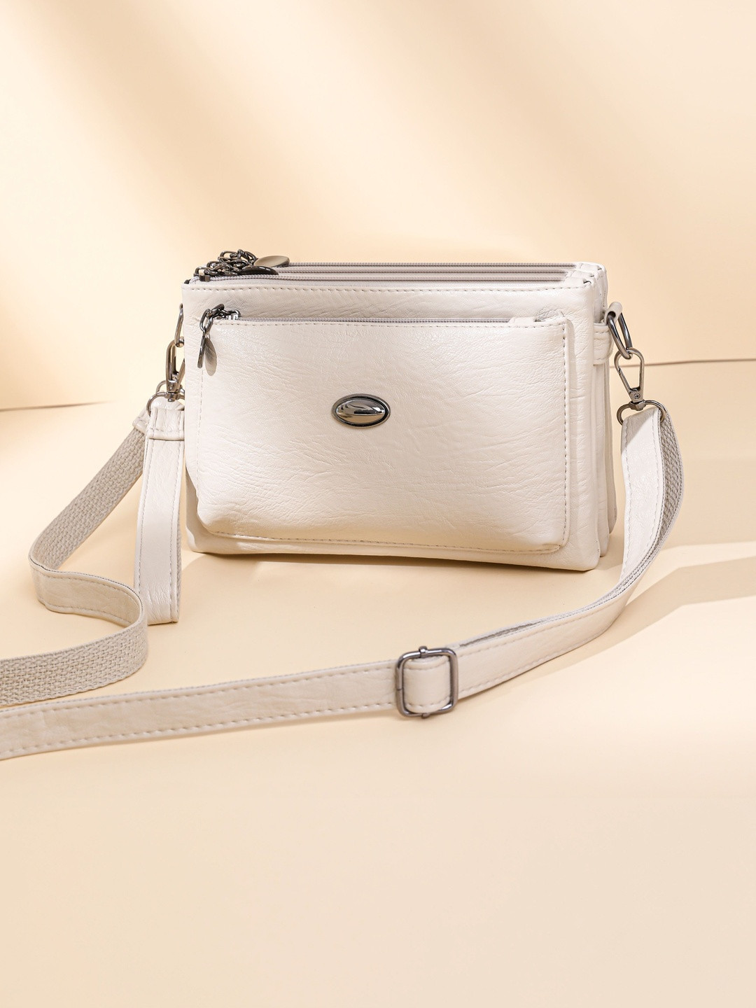 CORSICA Textured Structured Sling Bag