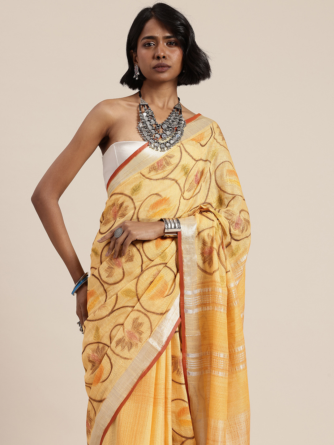 Taavi Woven Legacy and Embroidered Pure Cotton Zari Handloom Saree