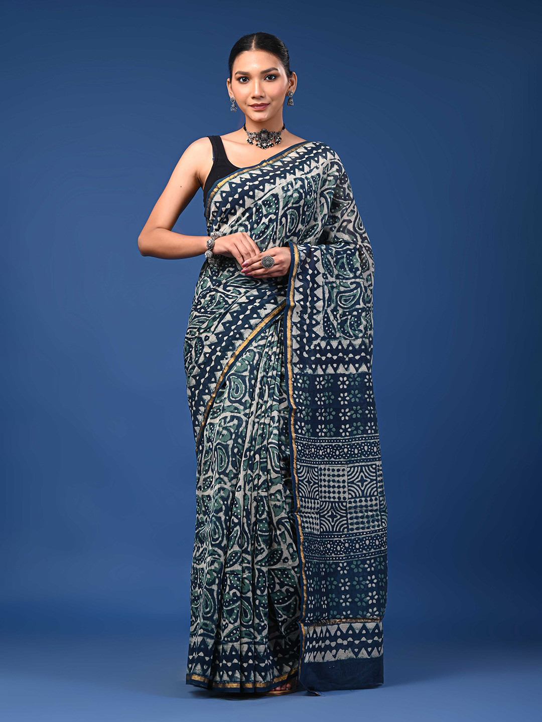 Taavi Women Dabu Hand Block Printed Chanderi Saree With Zari Border