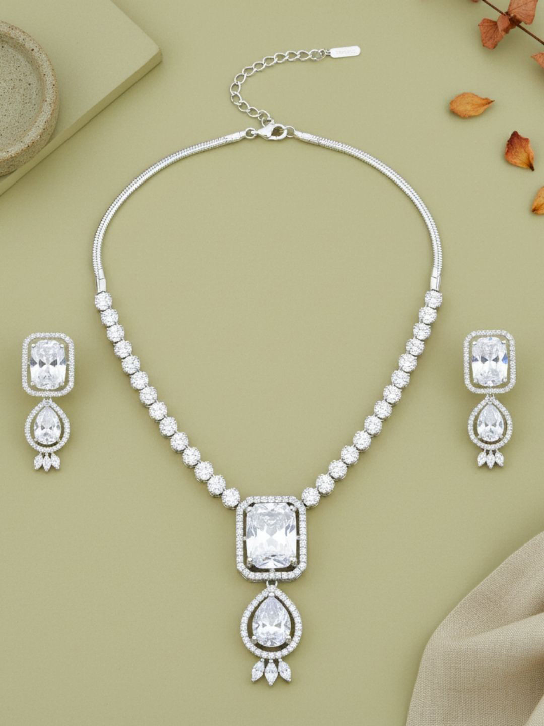 IKSAVA Women Silver-Plated Princess Cut American Diamond Studded Jewellery Set