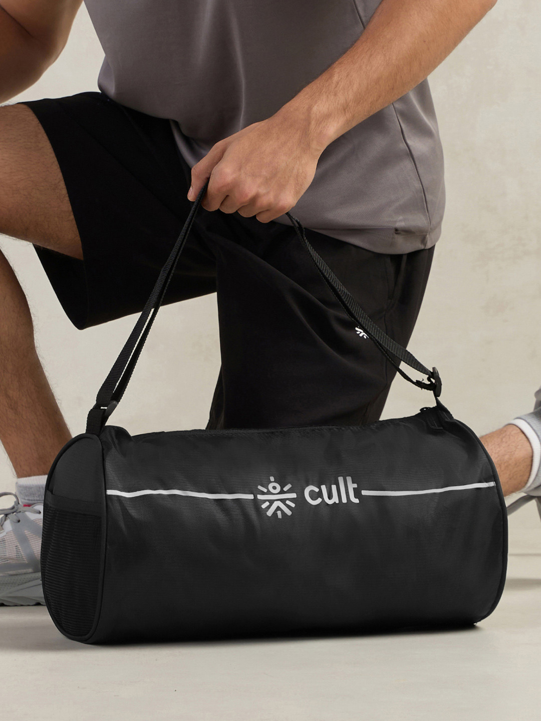 CULT Black Duffle Bag Unisex Adjustable Strap Mesh pocket Gym & Sport Bag 12 L