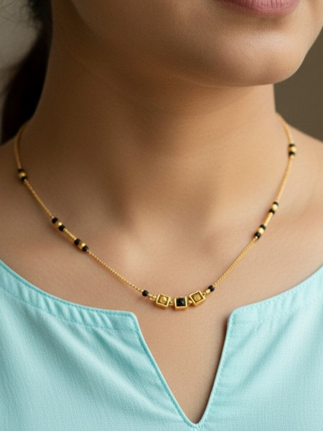 Anouk Gold-Plated Artificial Stones and Beads Mangalsutra