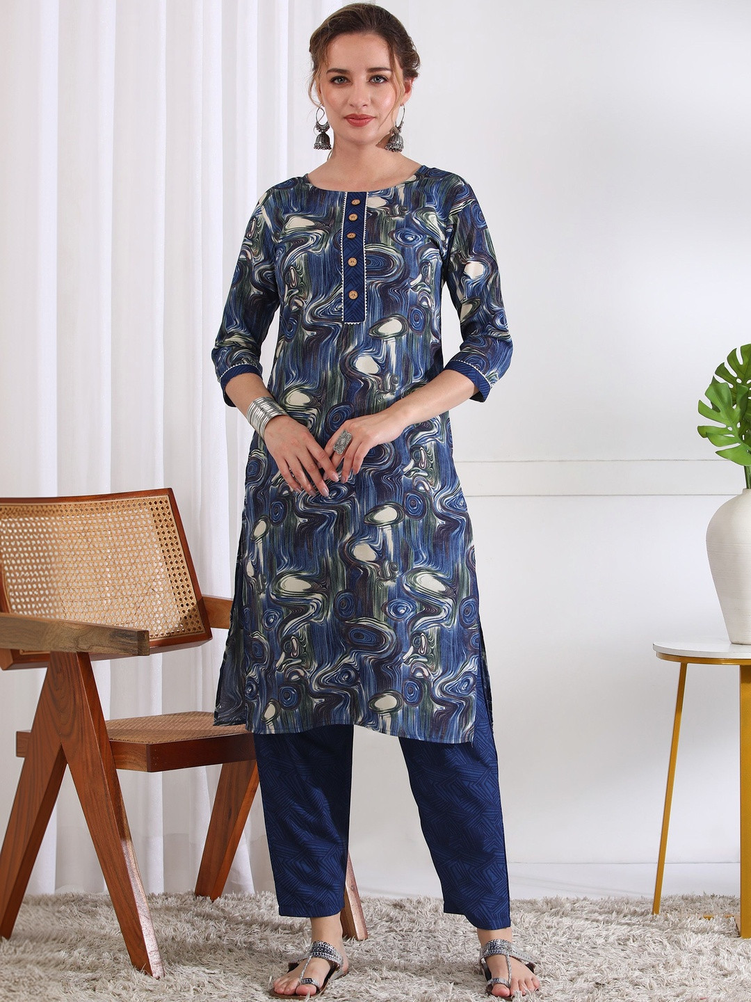 Moda Rapido Women Printed Regular Kurta with Trousers
