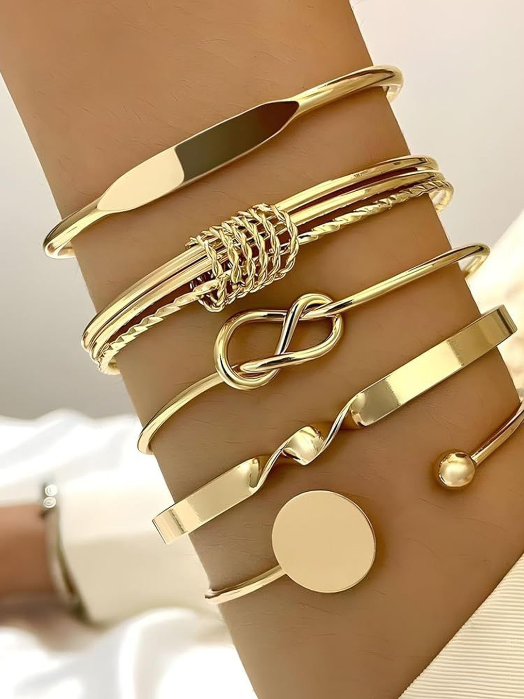 Zaphariq Women 5 Gold-Plated Cuff Bracelet