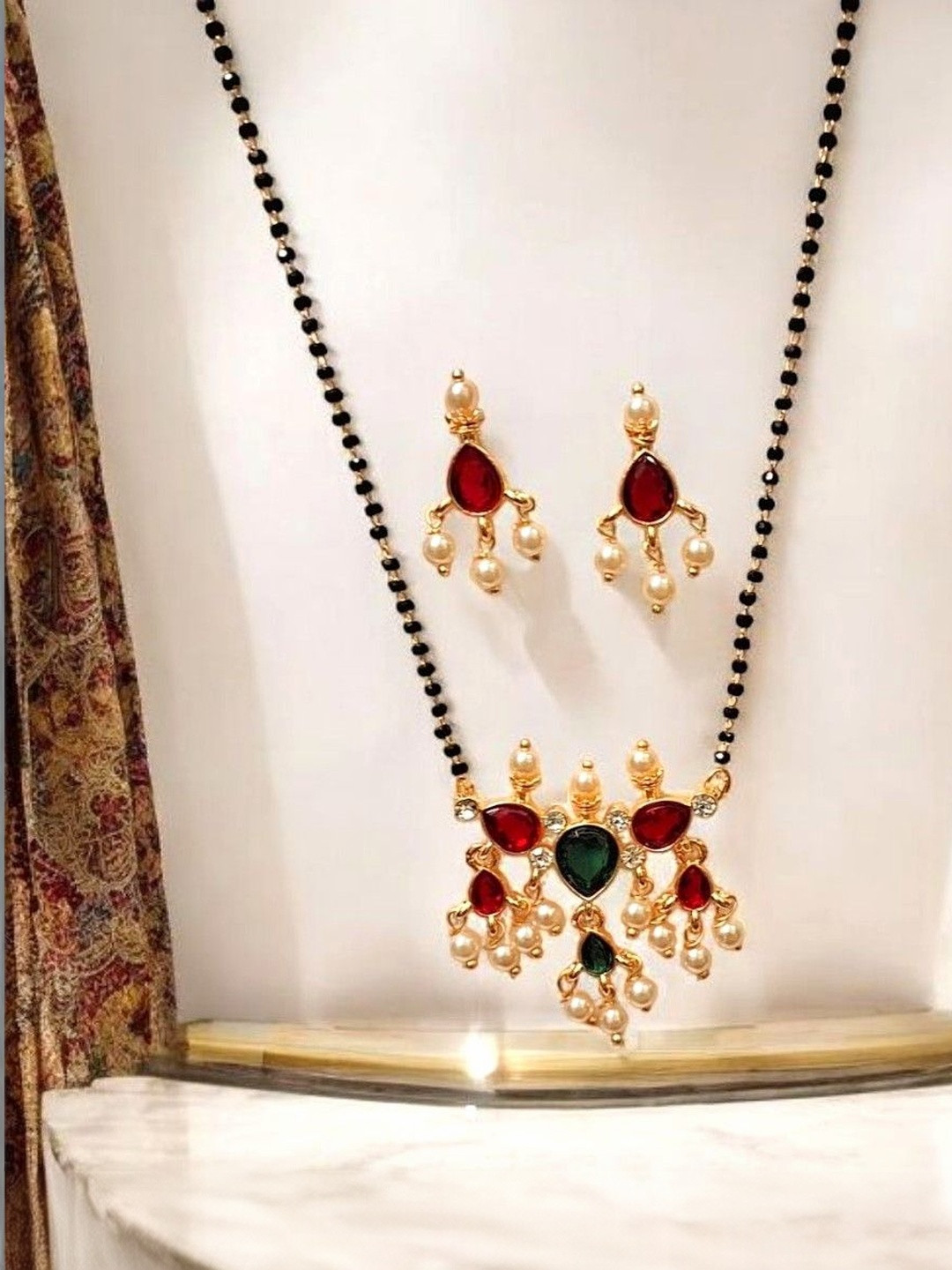 INDIAURA MODE Women Gold-Plated Artificial Stones and Beads Mangalsutra