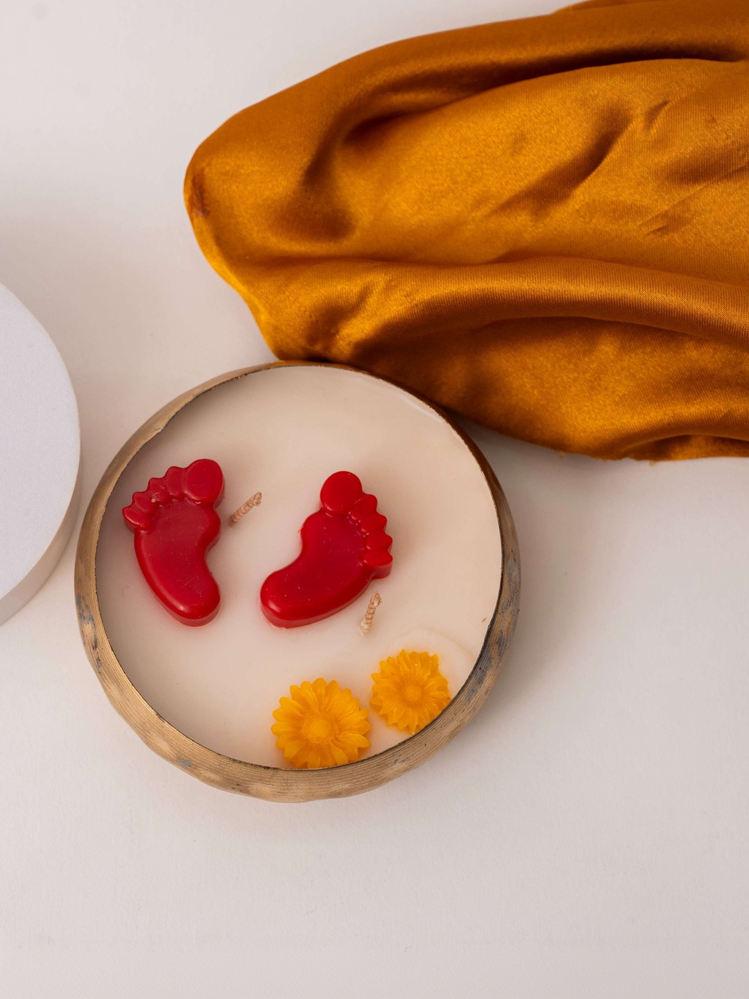 gabrunaari White & Red Scented Divine Glow Urli Metal Candle with Laxmi Maa Footsteps