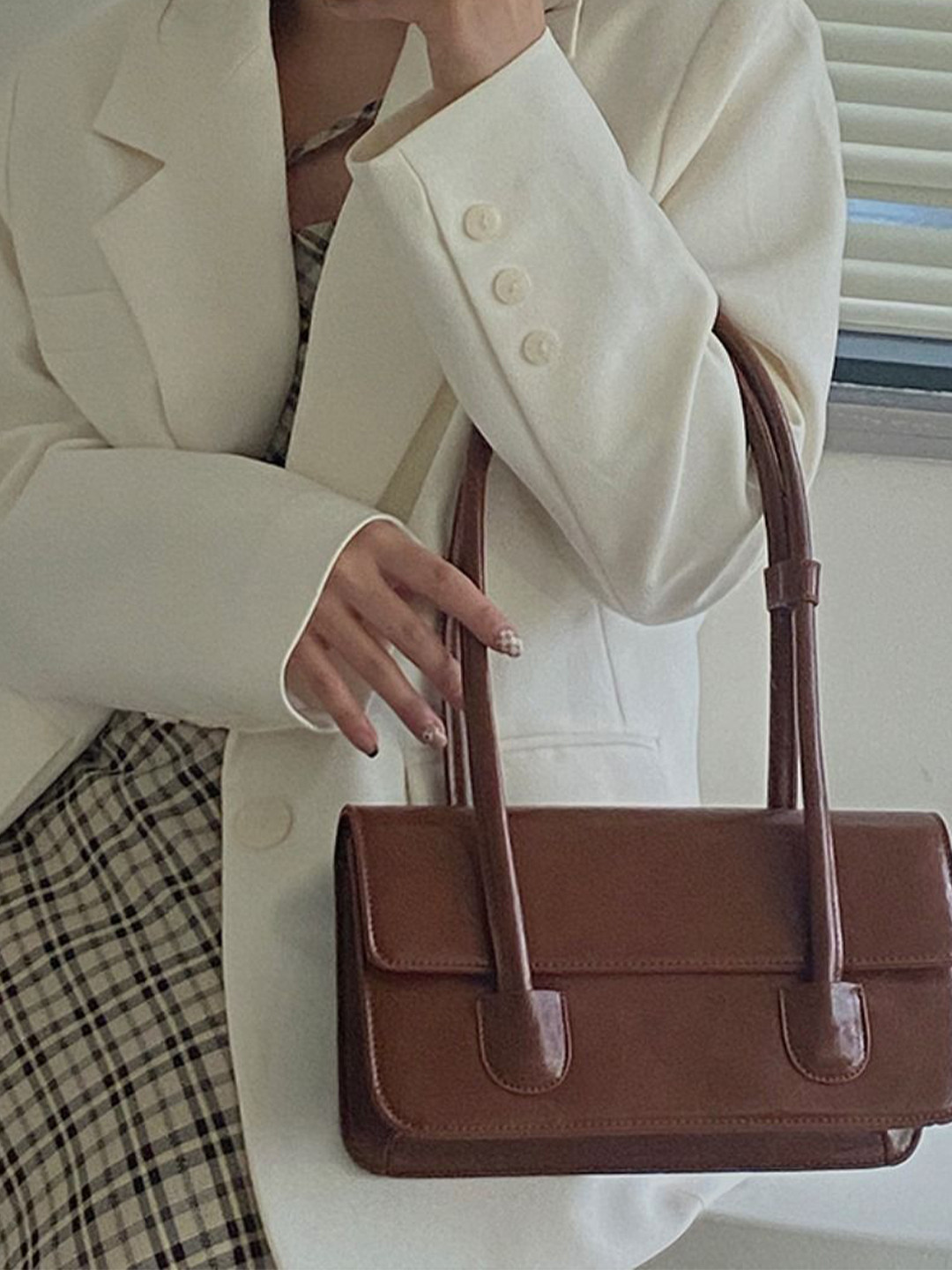 StyleCast Push Lock Quilted Swagger Handheld Bag