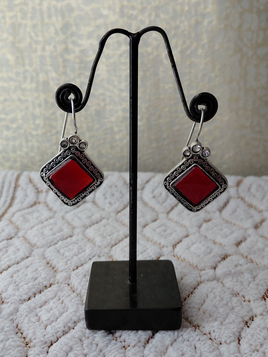 Nirali Creation Silver-Plated Stones Studded Diamond Shaped Oxidised Drop Earrings