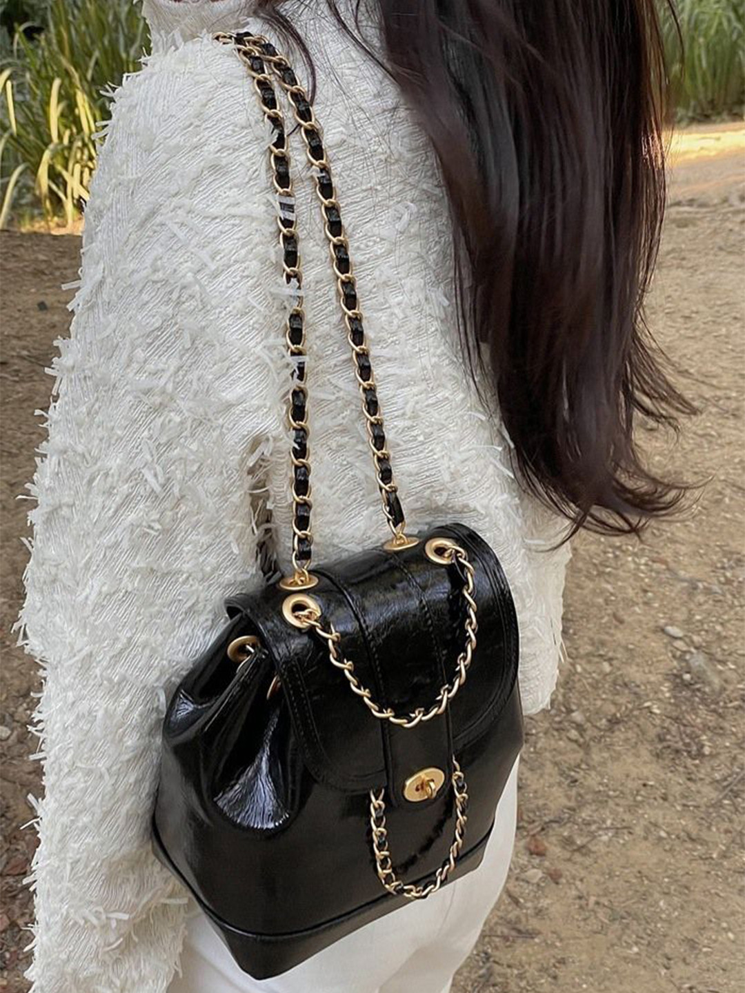 StyleCast Women Medium Solid Magnetic Button Backpack