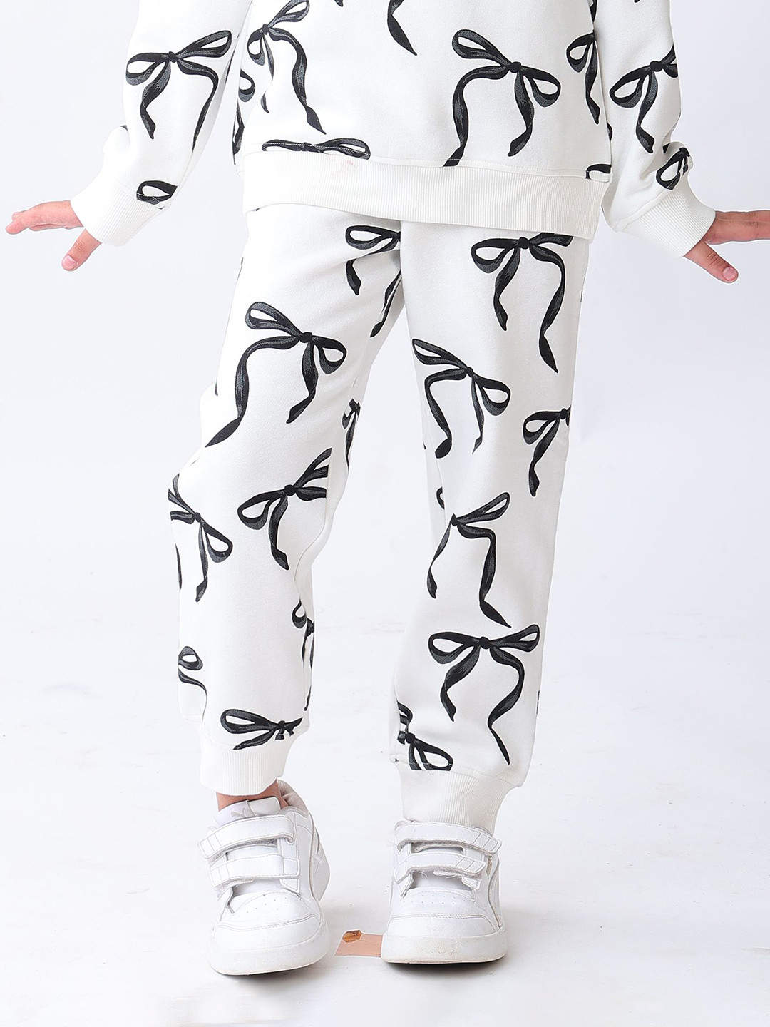 Anthrilo Girls Off White Black Bow Printed Mid-Rise Regular Fit Joggers