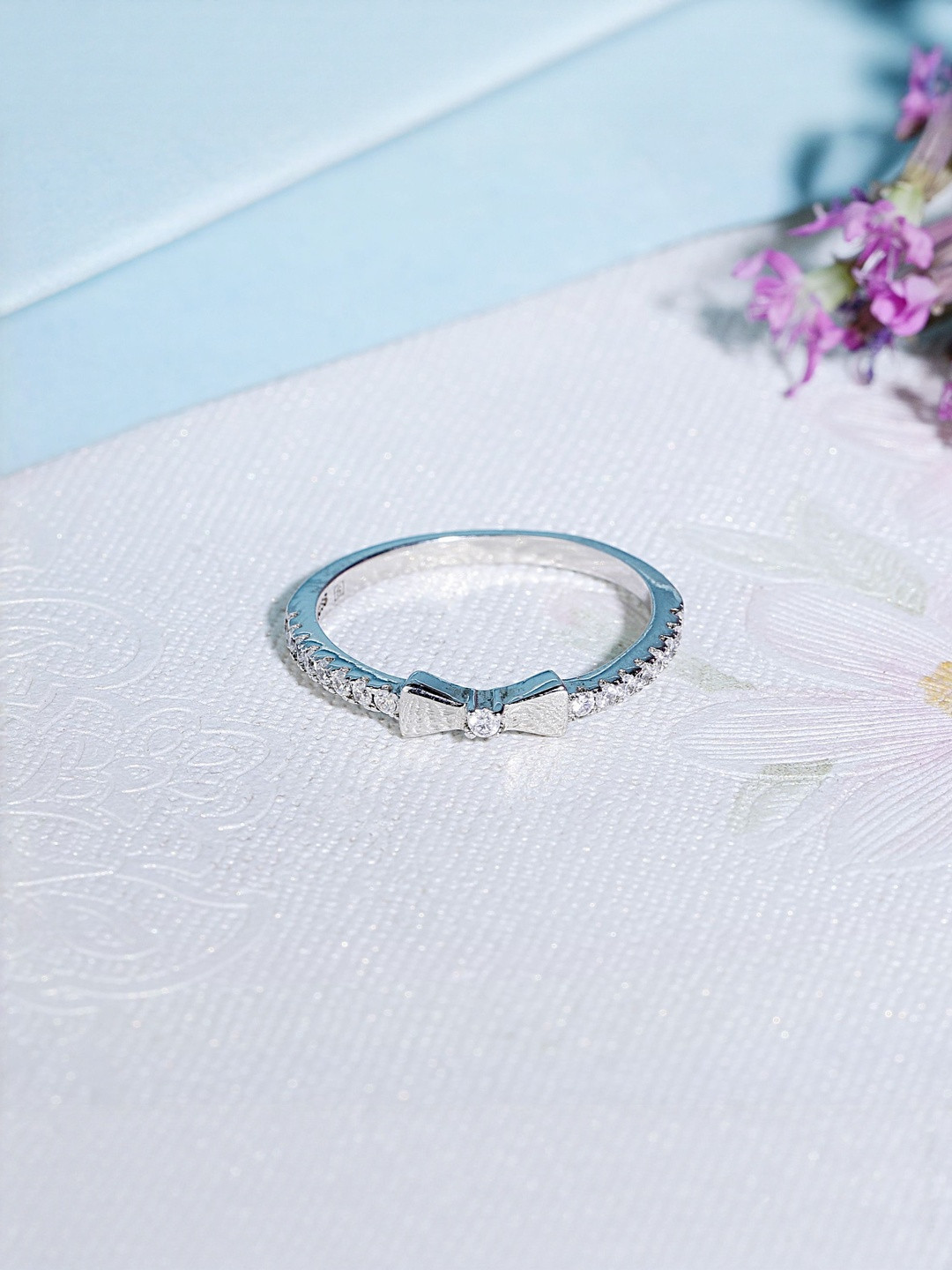 Eri Sterling Silver-Plated American Diamond Studded Adjustable Mini Bow Tie Finger Ring