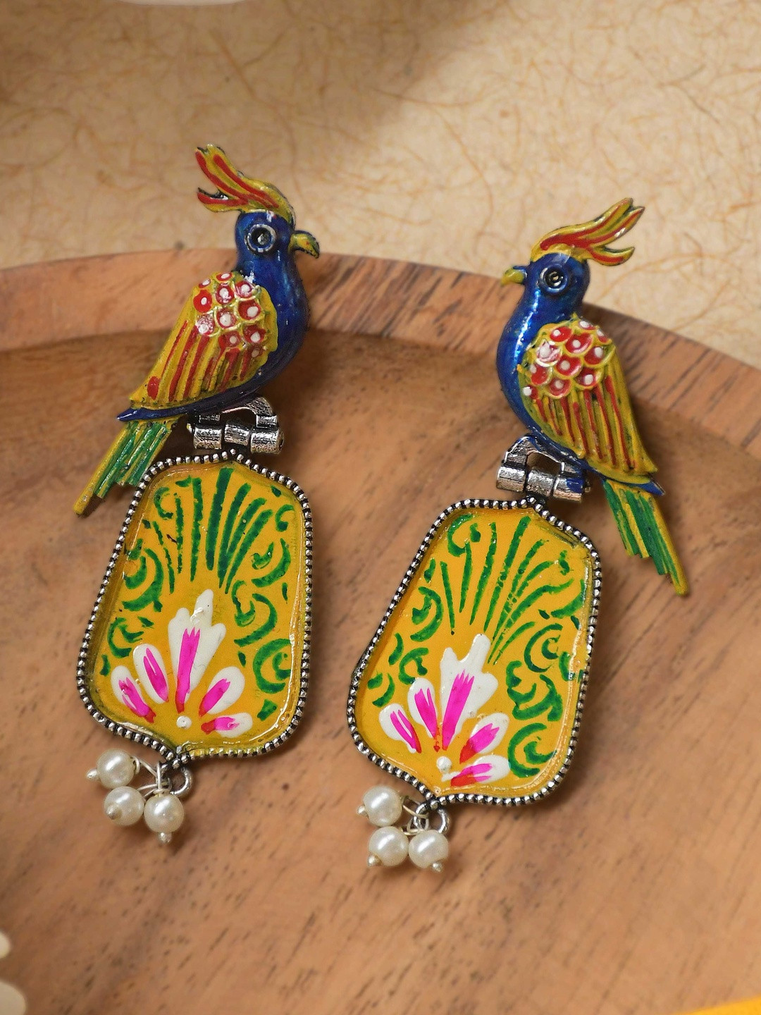 NAMAN ARTS Women Animal Shaped Silver-Plated Drop Earrings