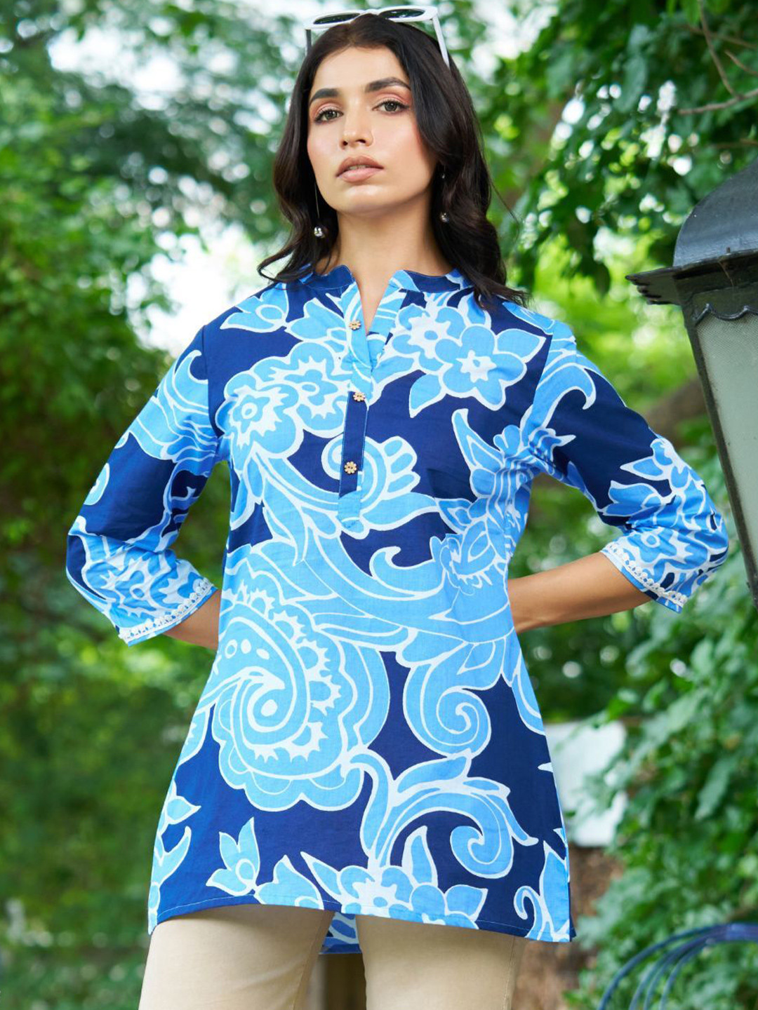 Kaftanize Women Off - White Base with Blue Floral Bold Floral Print Short Kurti