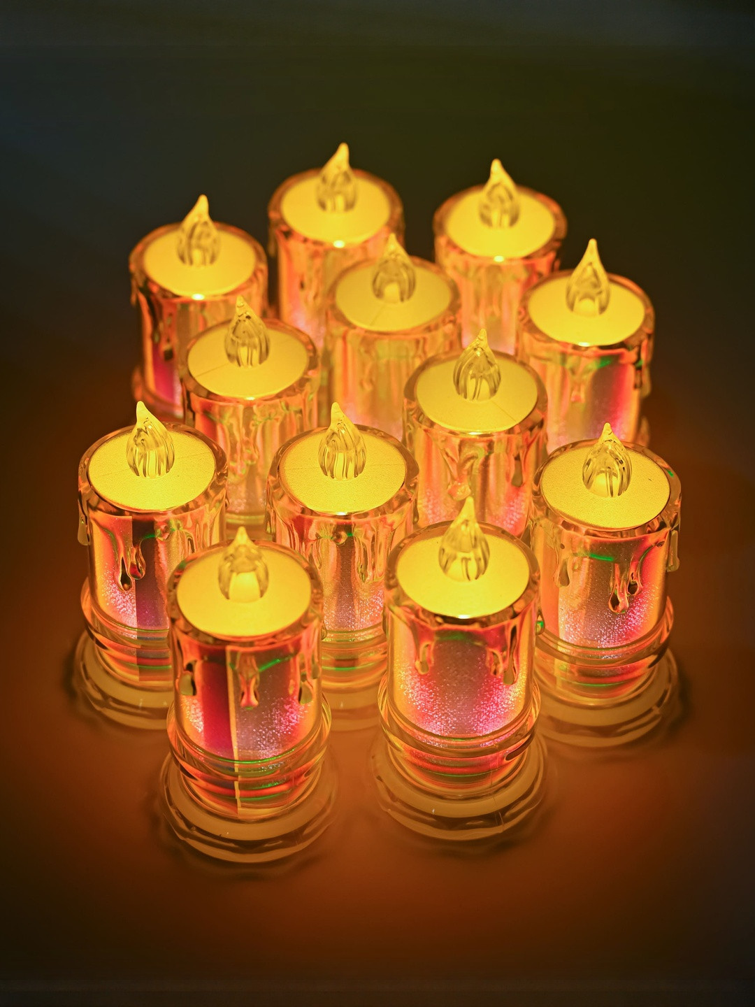 HINDCRAFT Set Of 12 Off White & Gold Plastic Candles Showpiece