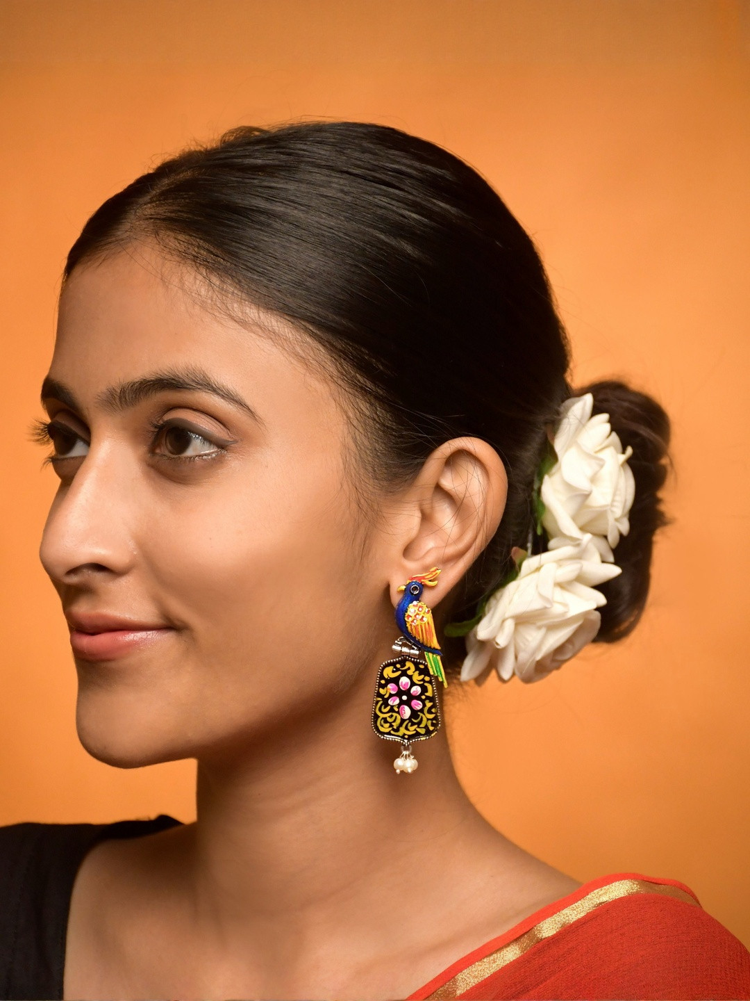 NAMAN ARTS Women Animal Shaped Silver-Plated Drop Earrings