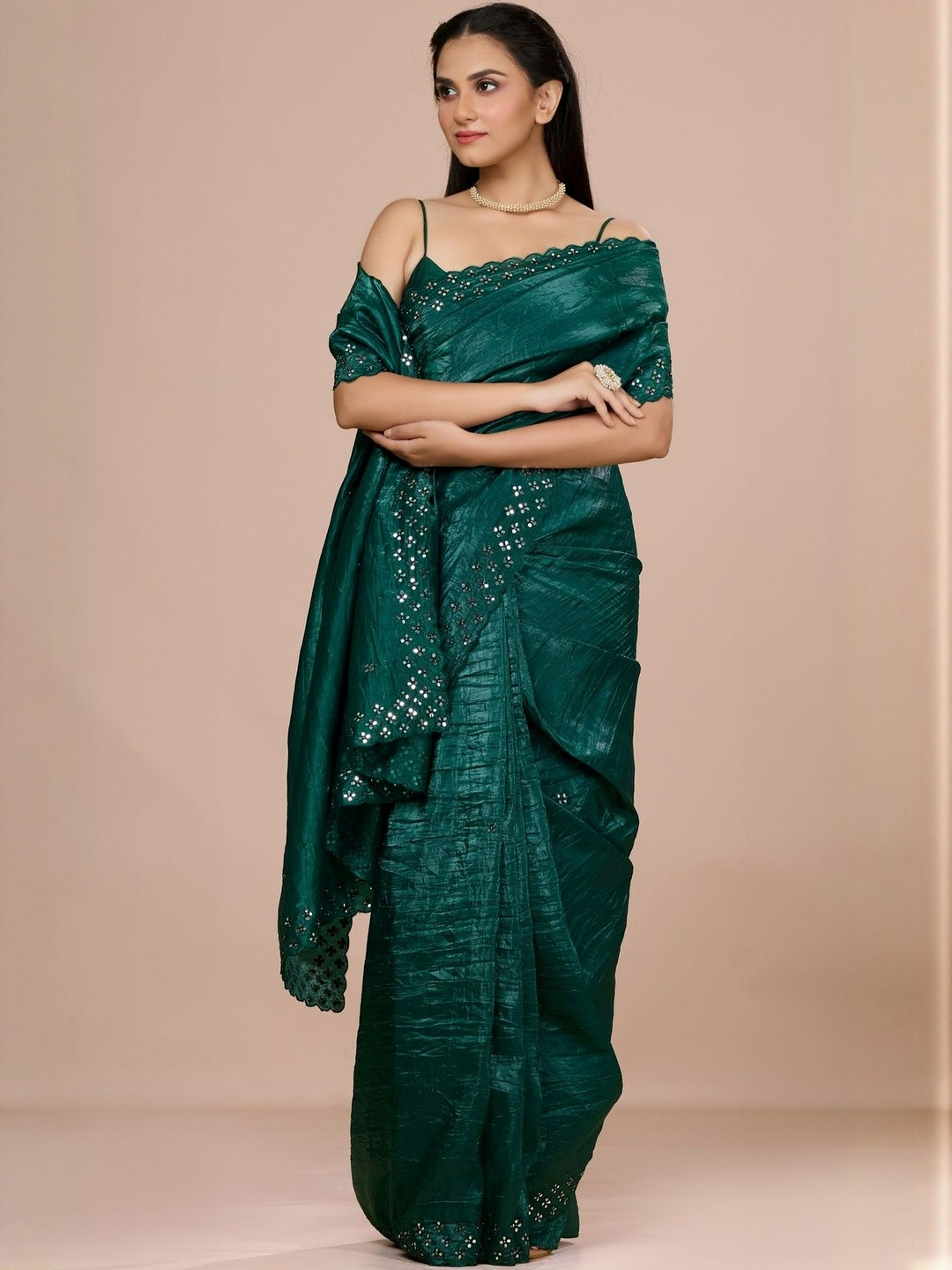 Aparnaa Solid Embellished Sequinned Tissue Saree With Intricate Mirror Detailing Border
