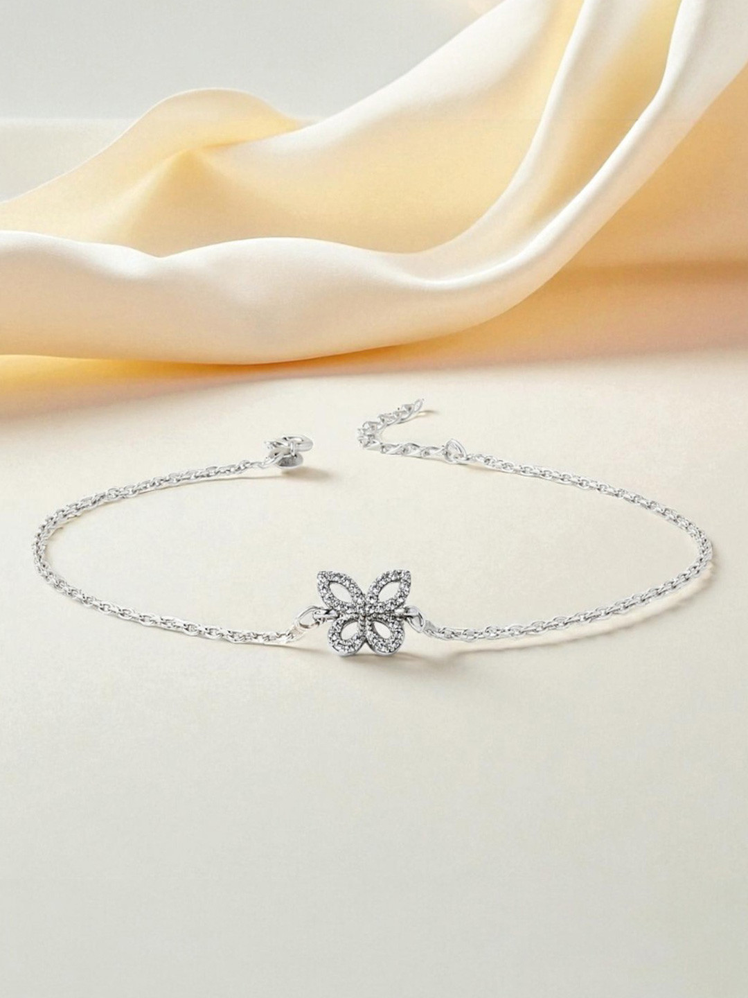 AKSHAT SAPPHIRE Silver-Plated Artificial Stones Studded Trendy Butterfly Anklet