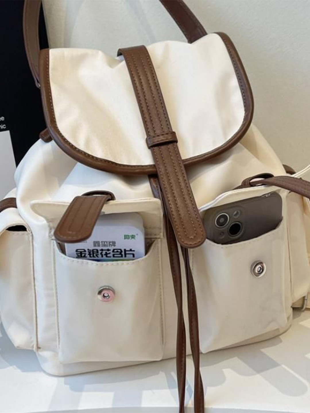StyleCast Women Yoke-Style Solid Backpack Come With Charm