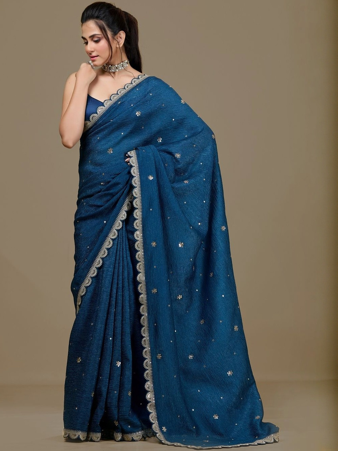 Aparnaa Embellished Sequinned Tissue Crushed Saree With Scallop Border